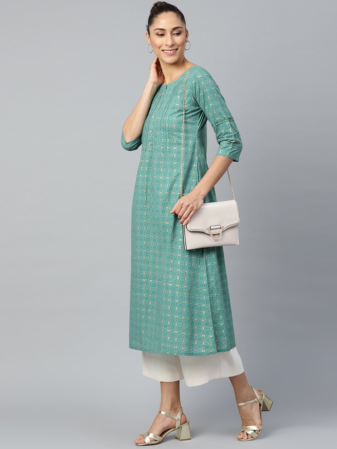 Women's Green Calf Length Three-Quarter Sleeves A-Line Geometric Yoke Design Cotton Kurta