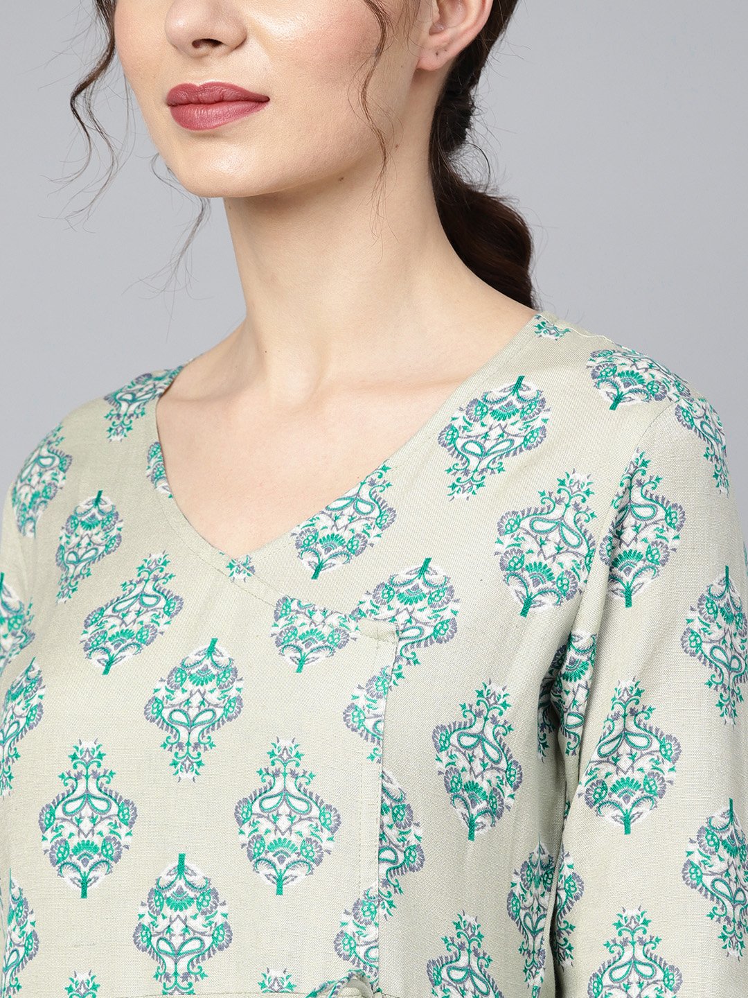 Women's Sage Green Printed V-Neck Angrakha Style 3/4Th Assymetrical Sleeve Falred Kurta With Solid Pants.