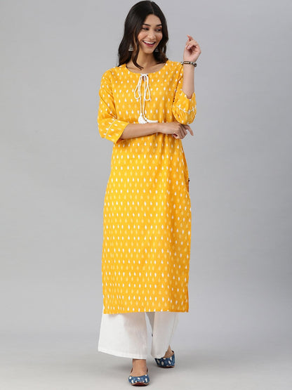 Women's KSUT Mustard And White Ikkat Printed Straight Kurta With Dori And Tassel Detailing On Neckline