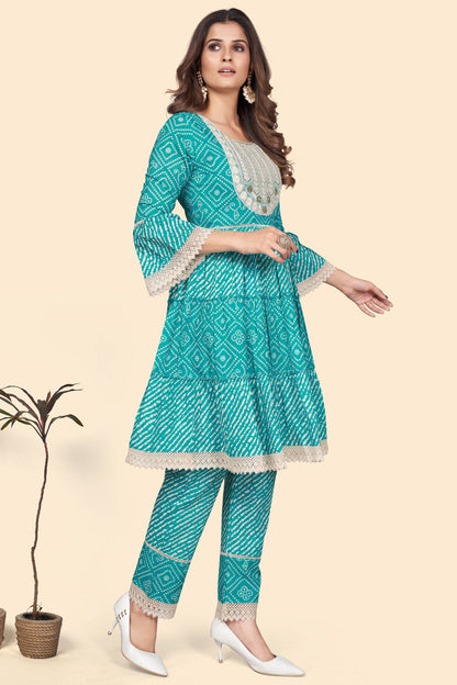 Women's Bandhani Print & Embroidered Flared Cotton Sky Blue Stitched Top With Pant