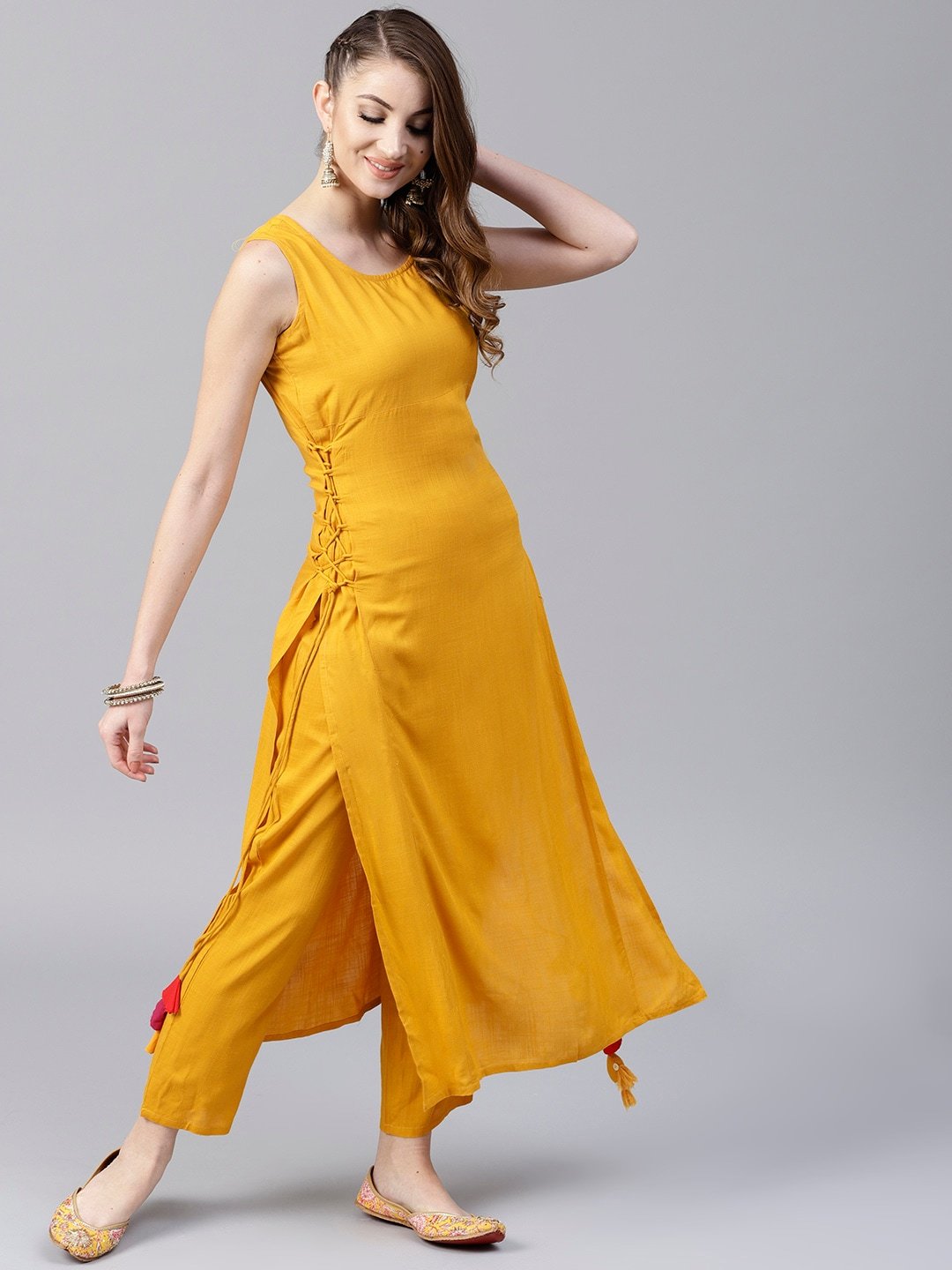 Women's  Mustard Solid Straight Kurta