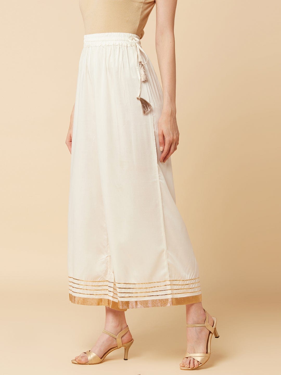 Women's Off-White Flared Solid Palazzos