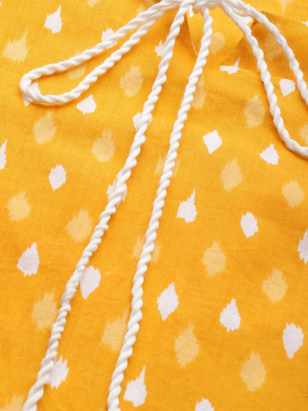 Women's KSUT Mustard And White Ikkat Printed Straight Kurta With Dori And Tassel Detailing On Neckline