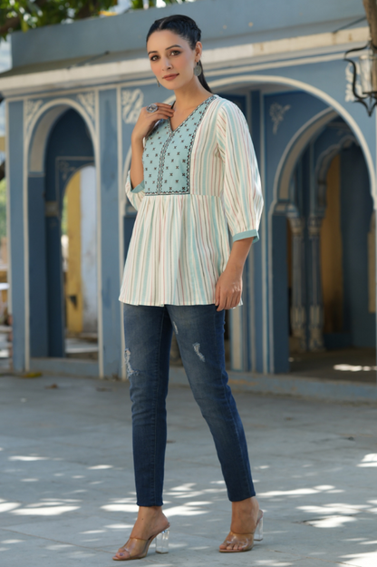 Women's Ivory Rayon Staple Striped Printed Peplum Tunic.