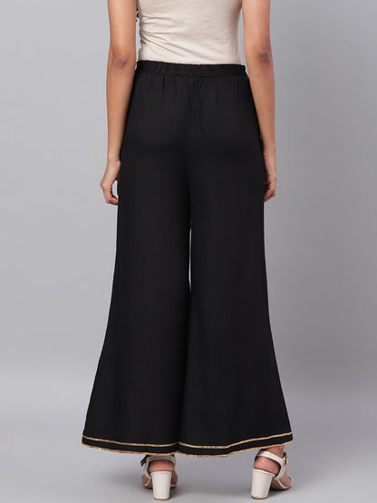 Women Black Solid Palazzo by Myshka (