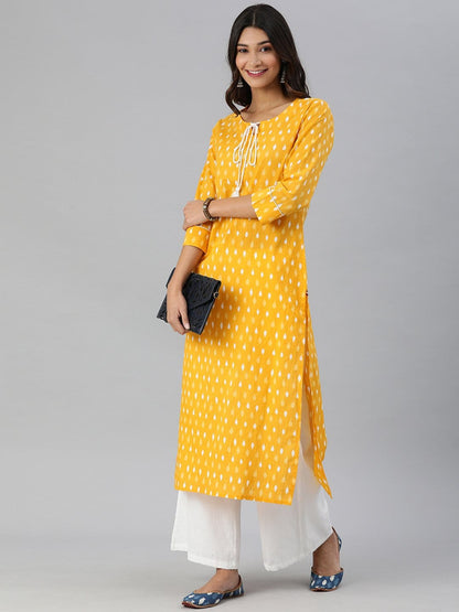 Women's KSUT Mustard And White Ikkat Printed Straight Kurta With Dori And Tassel Detailing On Neckline