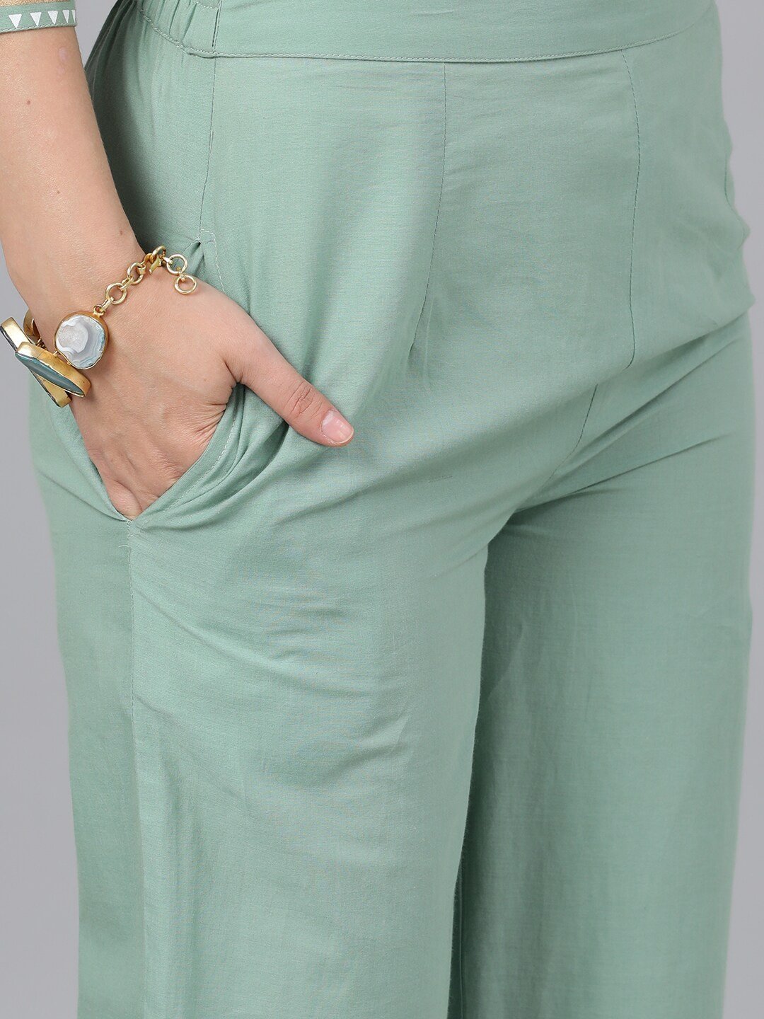 Women's  Green Solid Kurta with Trousers
