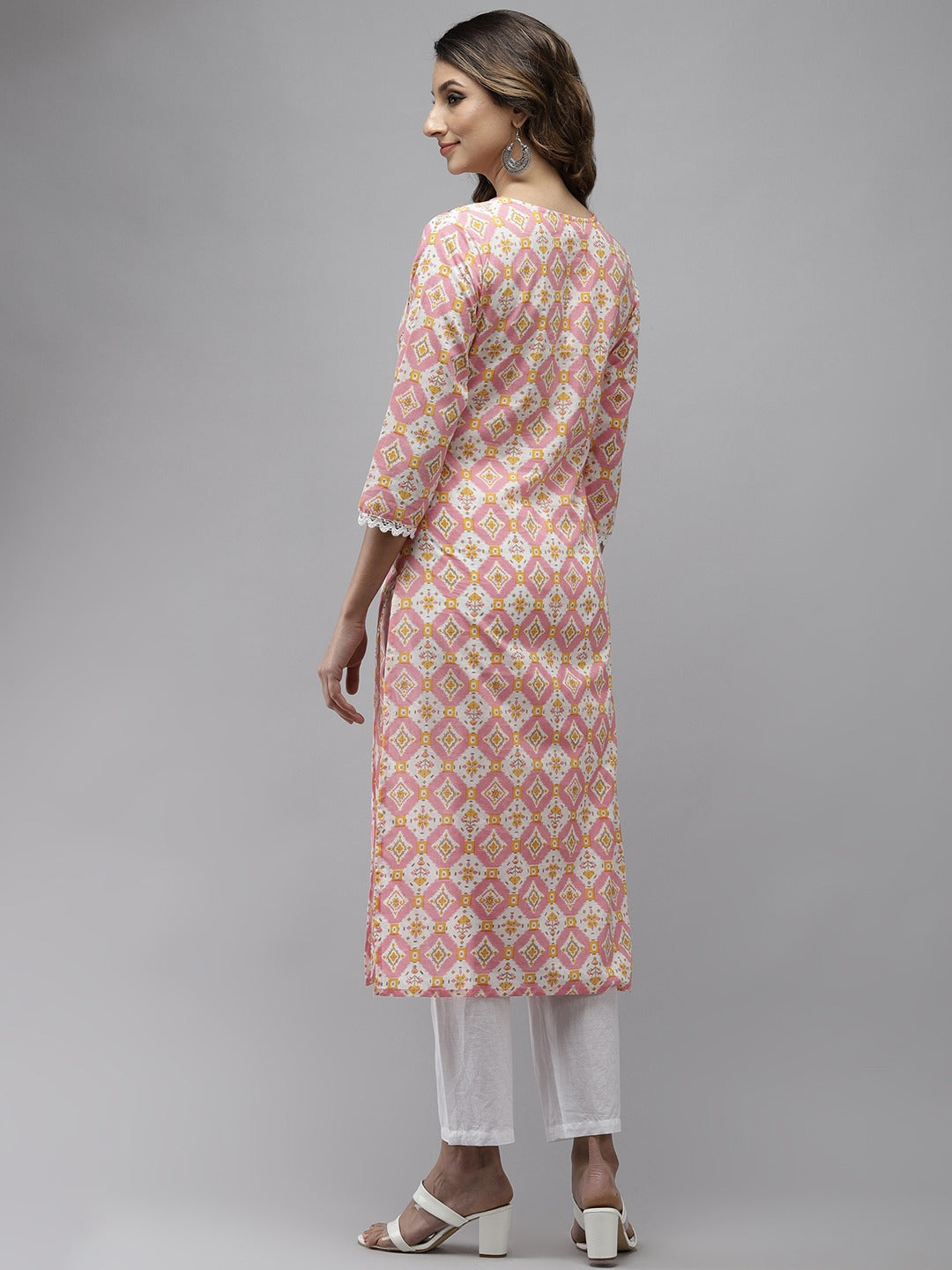 Women's Peach And White Kurta With Trousers Set