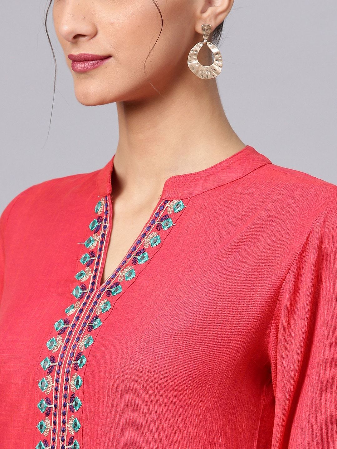 Women's  Coral Pink Solid Straight Kurta With Embroidered Detail