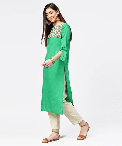 Women's Green Yoke Printed Half Sleeve Cotton Kurta With Cream Ankle Length Pallazo