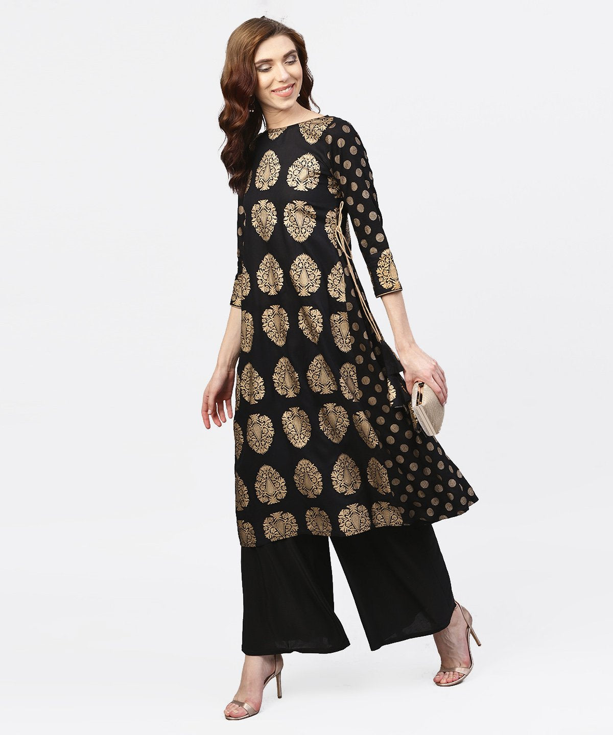Women's Black And Gold Printed Kurta With Round Neck And Full Sleeves