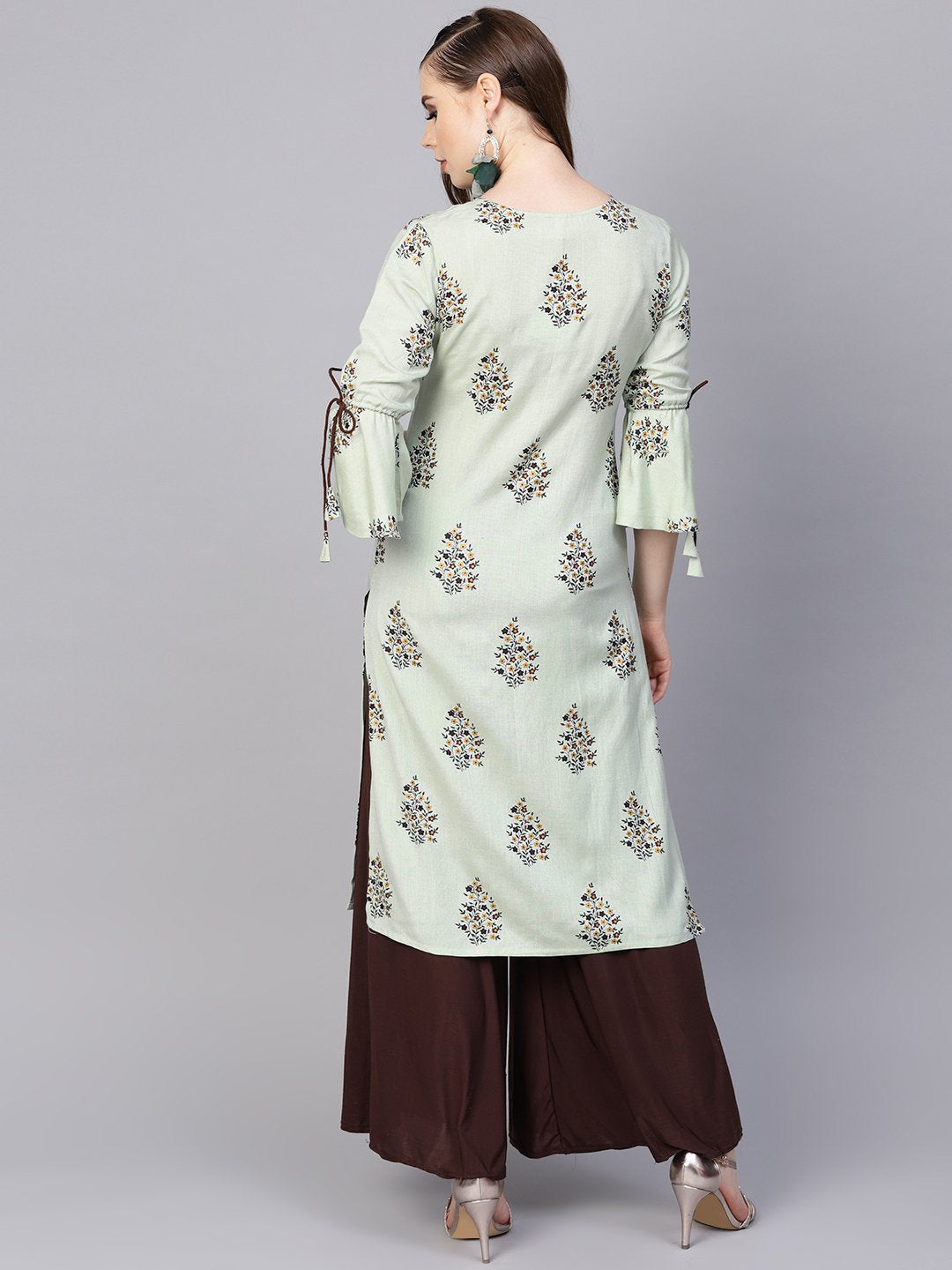 Women's Pista Green Floral Printed Kurta With A Front Keyhole And Flared Sleeves