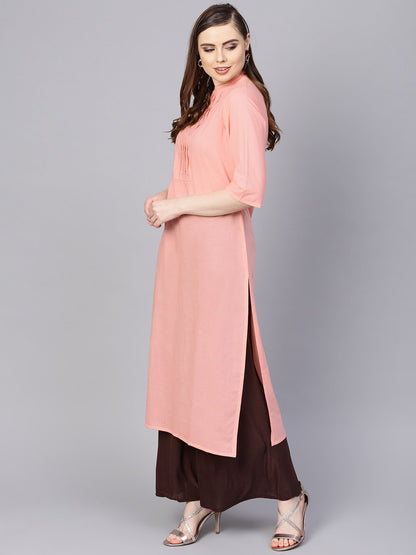 Women's Solid Peach Kurta With Closed Collar And Pleats In Yoke