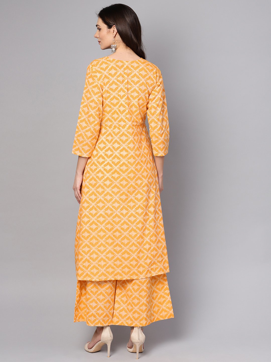 Women's Yellow Geometric Printed Kurta Set With Flared Palazzo