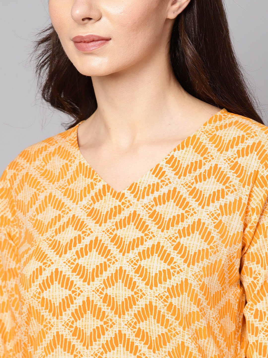 Women's Yellow Geometric Printed Kurta Set With Flared Palazzo