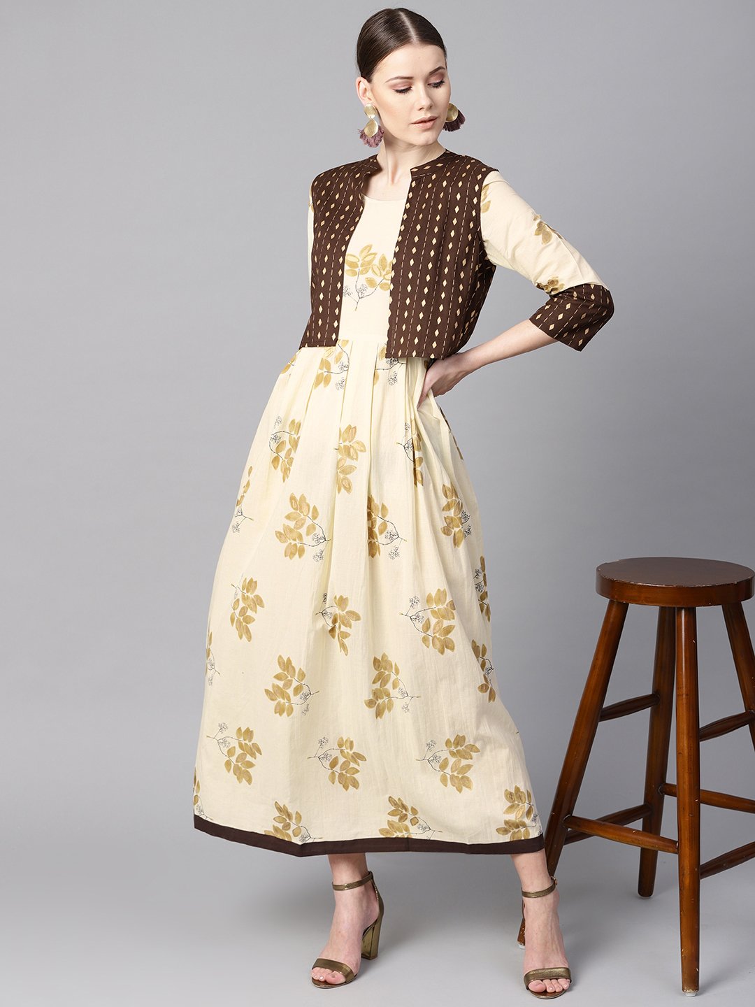 Women's White Floral Gold Printed Round Neck 3/4Th Sleeve Printed Maxi With Brown Geometrical Gold Printed Jacket.