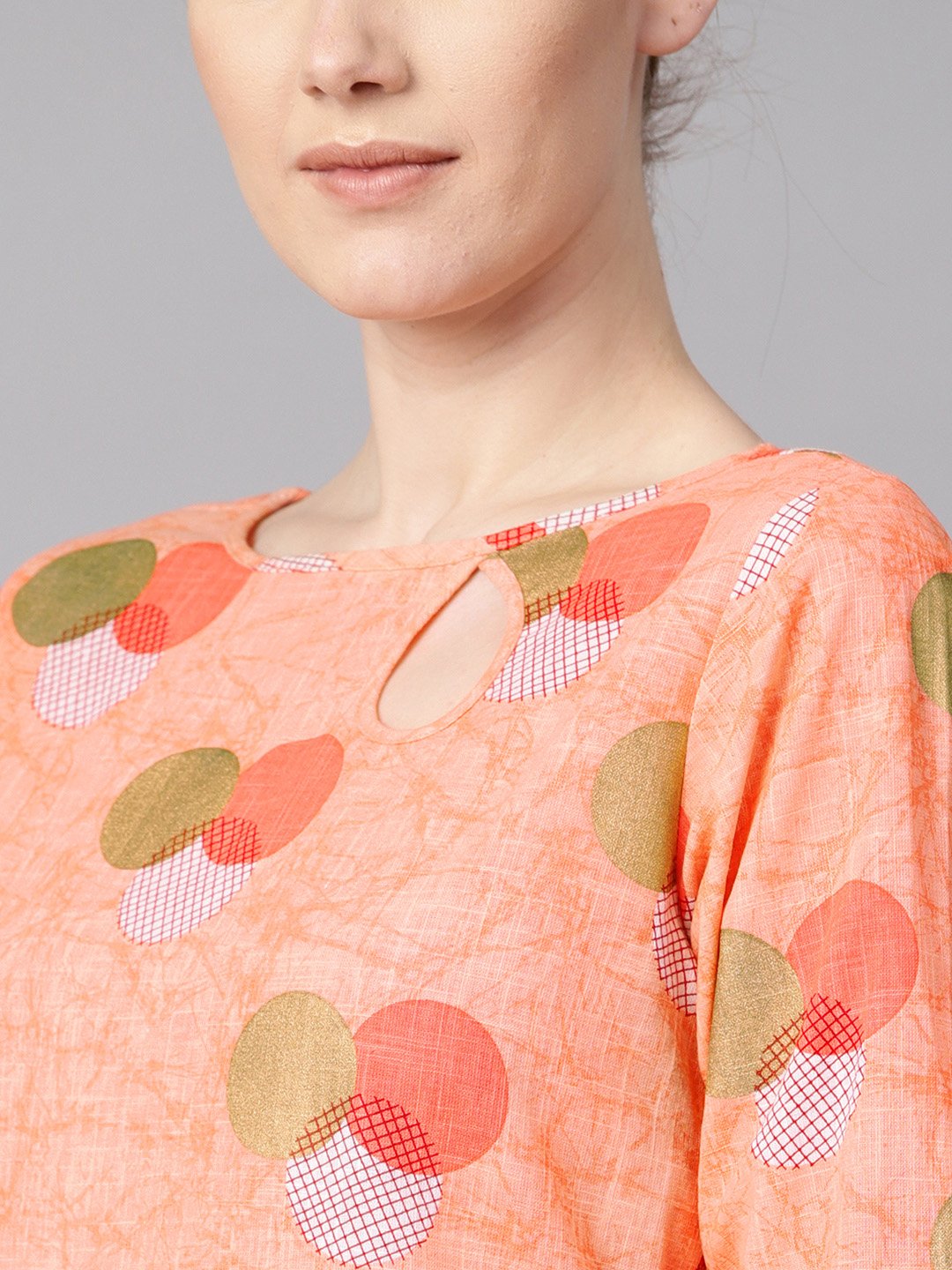 Women's Peach Color Polka Dots Printed Boat Neck With Side Keyhole  3/4Th Sleeve Kurta And Solid Cigratee Pants.