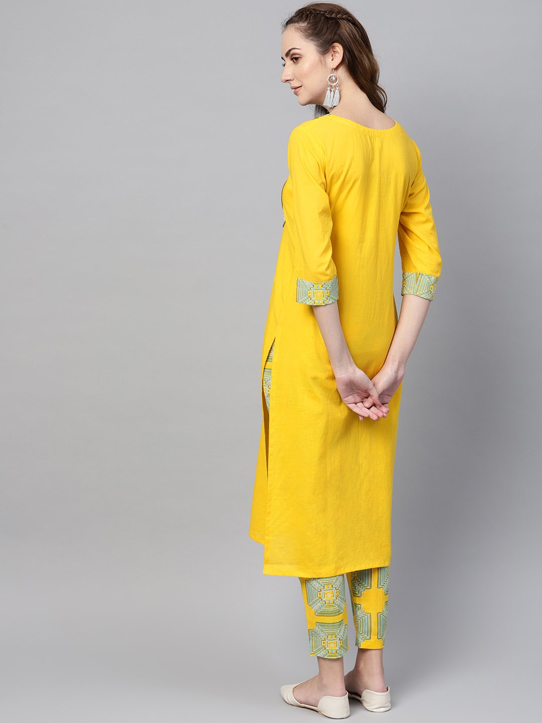 Women's Solid Yellow Kurta Set With Front Printed Yoke & Printed Pants