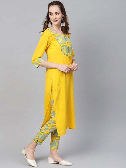 Women's Solid Yellow Kurta Set With Front Printed Yoke & Printed Pants
