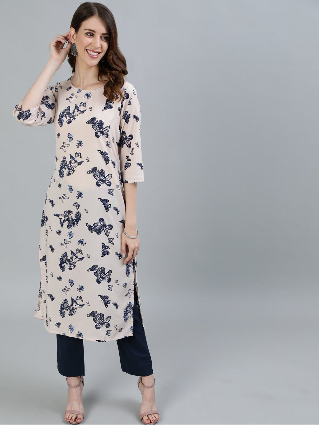 Women's Peach Printed Straight Kurta With Three Quarter Sleeves