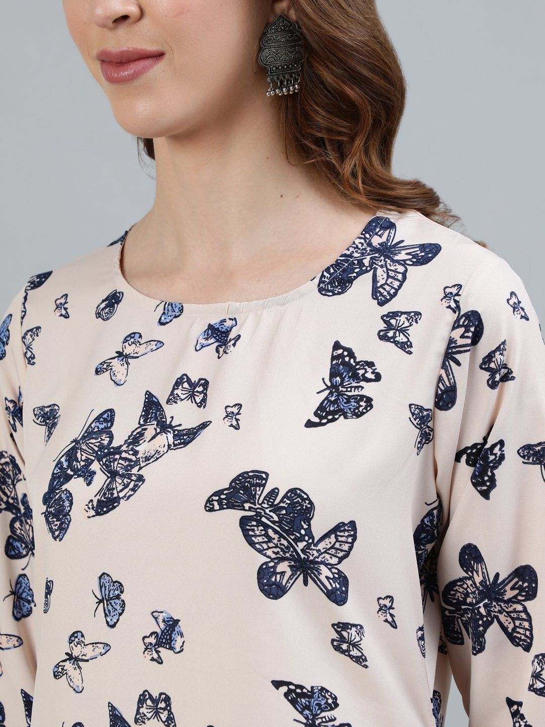 Women's Peach Printed Straight Kurta With Three Quarter Sleeves