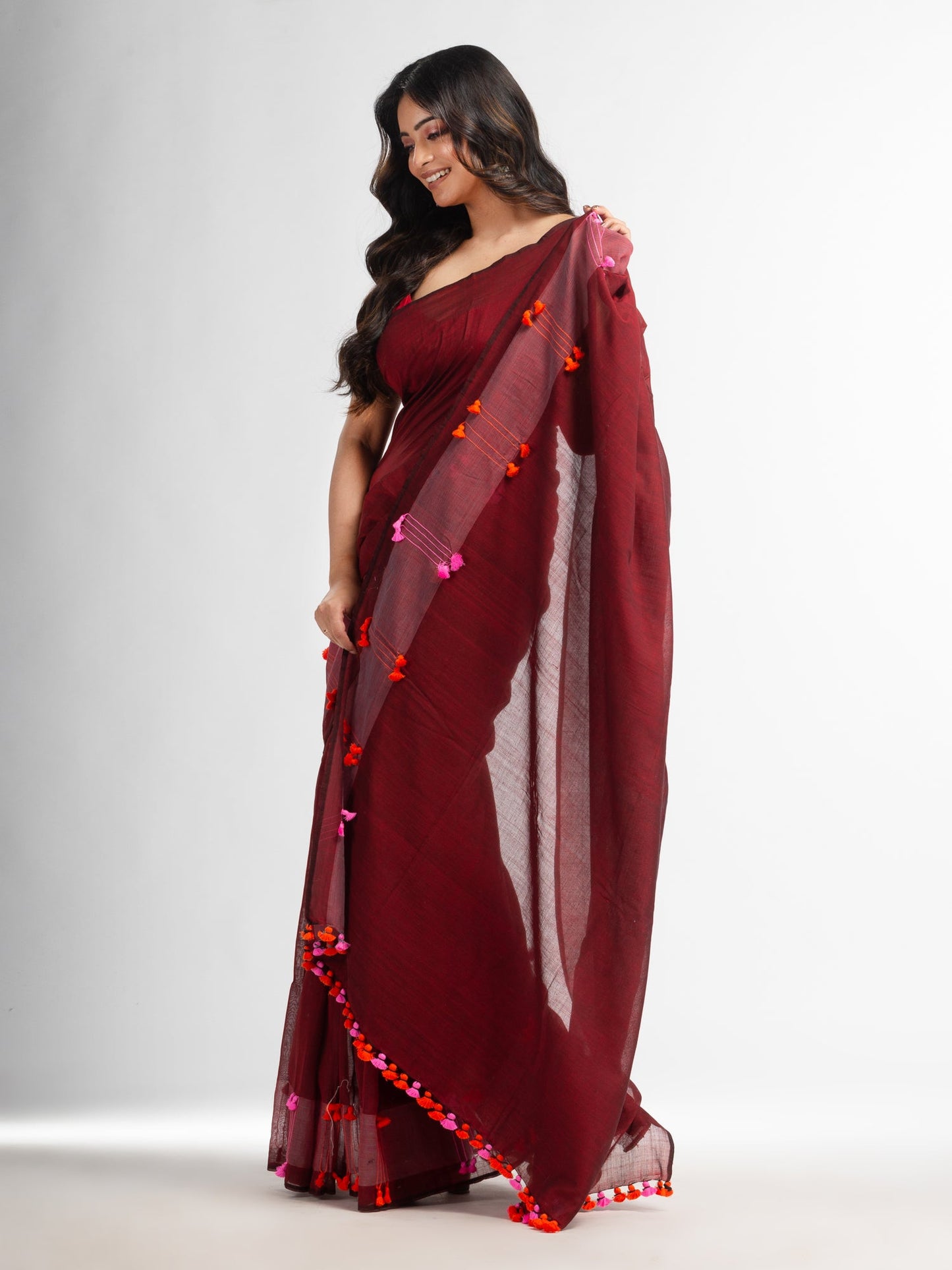 Women's Meroon cotton saree with multi colour thread weave and tassels