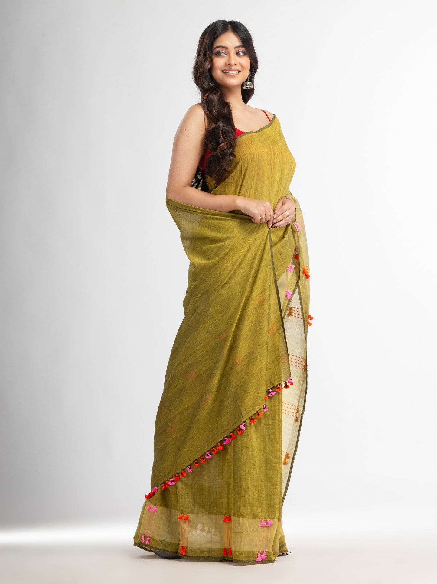 Women's Fern green cotton saree with multi colour thread weave and tassels
