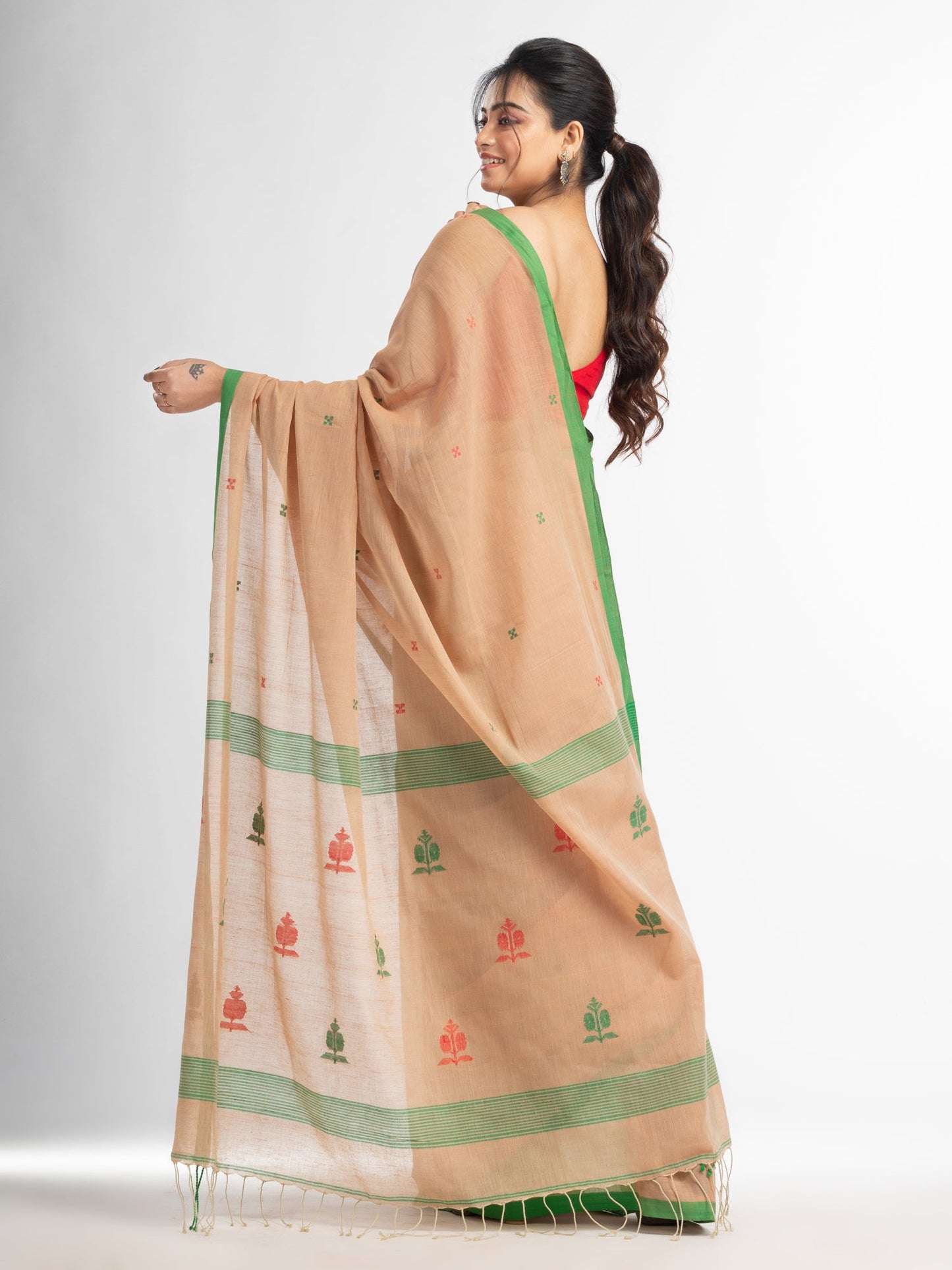 Women's Biscuit all body buti with buti in green border handwoven cotton saree