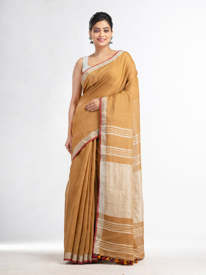 Women's saffron with silver zari pallu in silver zari border handwoven linen saree
