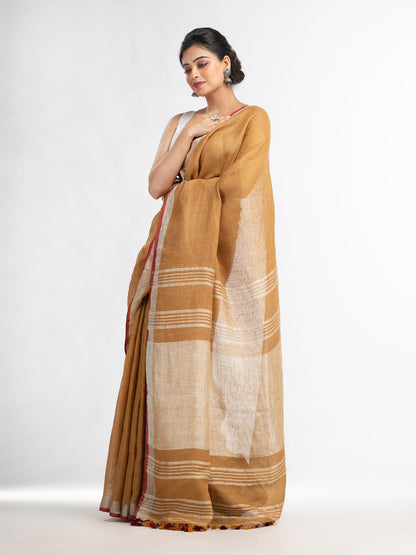 Women's saffron with silver zari pallu in silver zari border handwoven linen saree