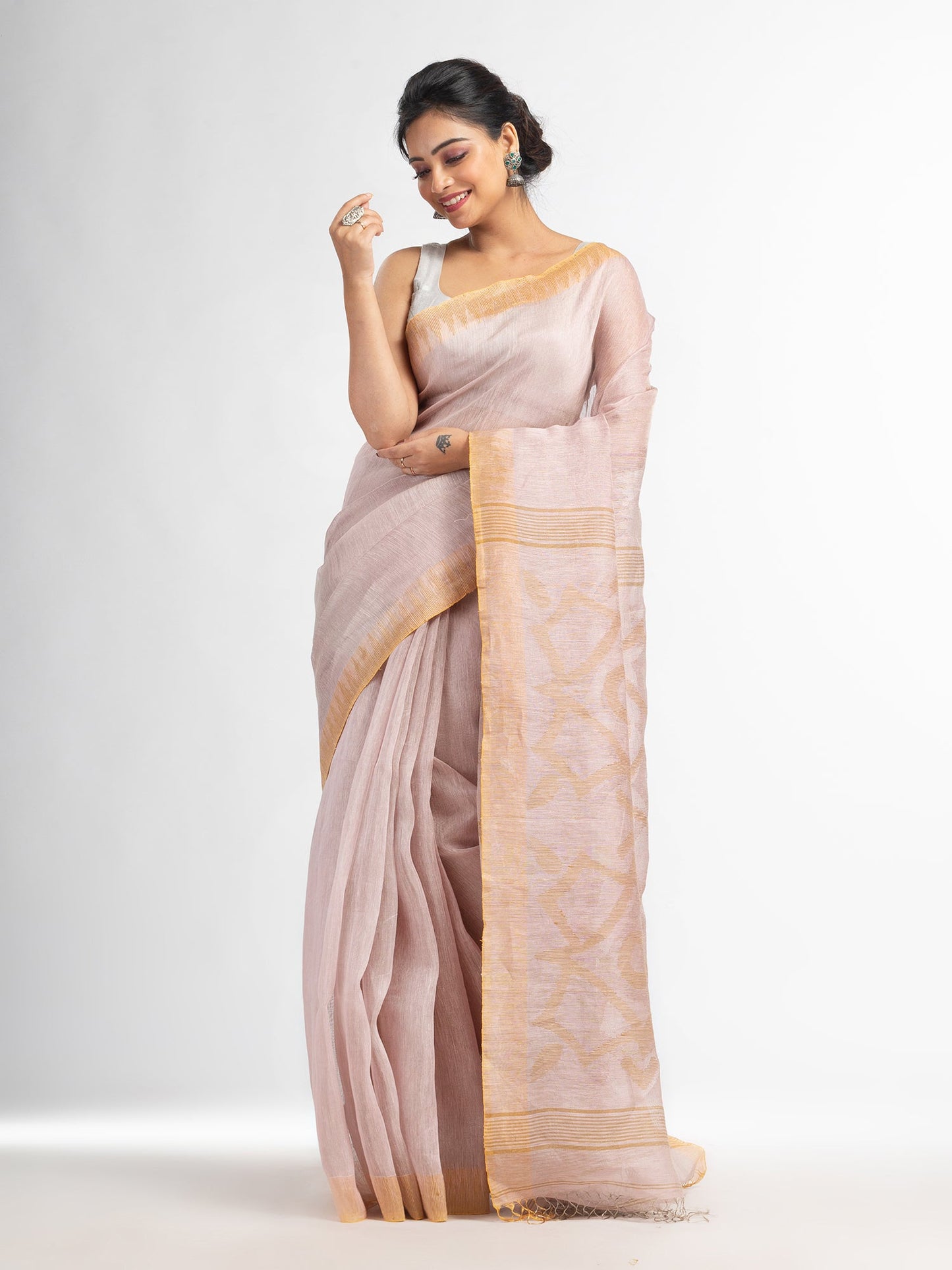 Women's Beige linen tissue pallu jamdanie temple border handwoven saree