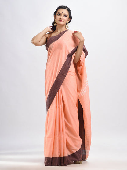 Women's Peach cotton solid body handloom saree
