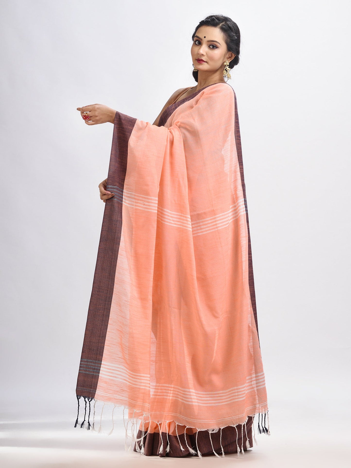 Women's Peach cotton solid body handloom saree