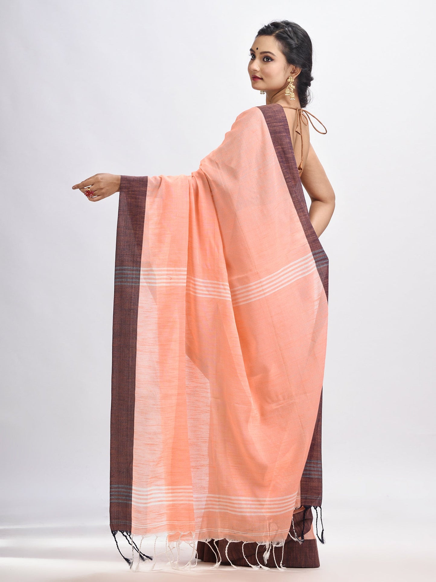 Women's Peach cotton solid body handloom saree