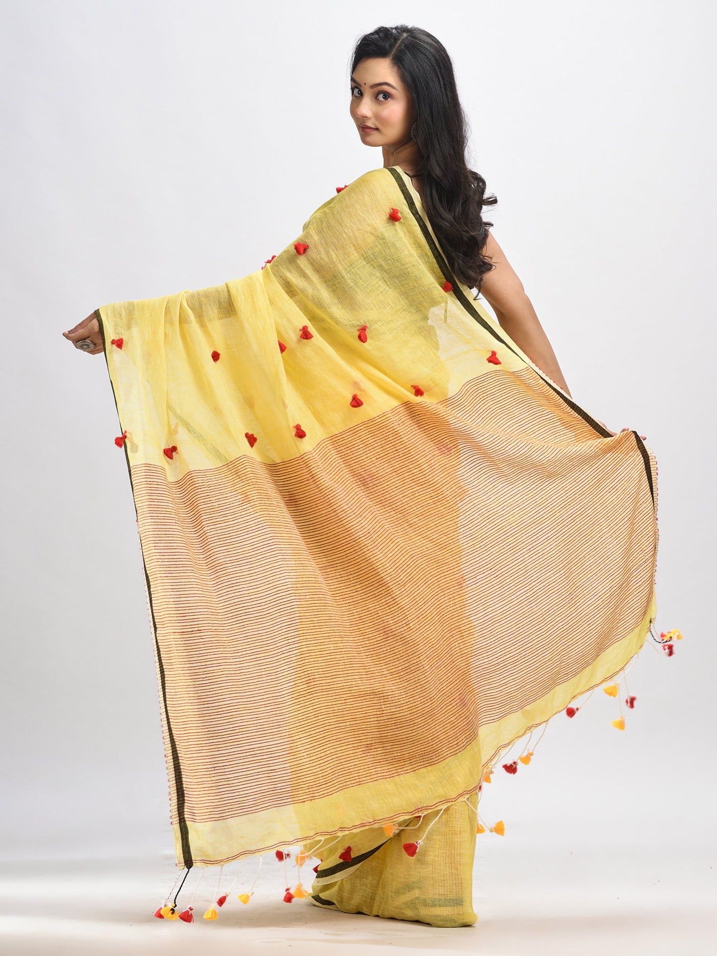 Women's Yellow linen all body pom pom with pallu stipe handwoven saree