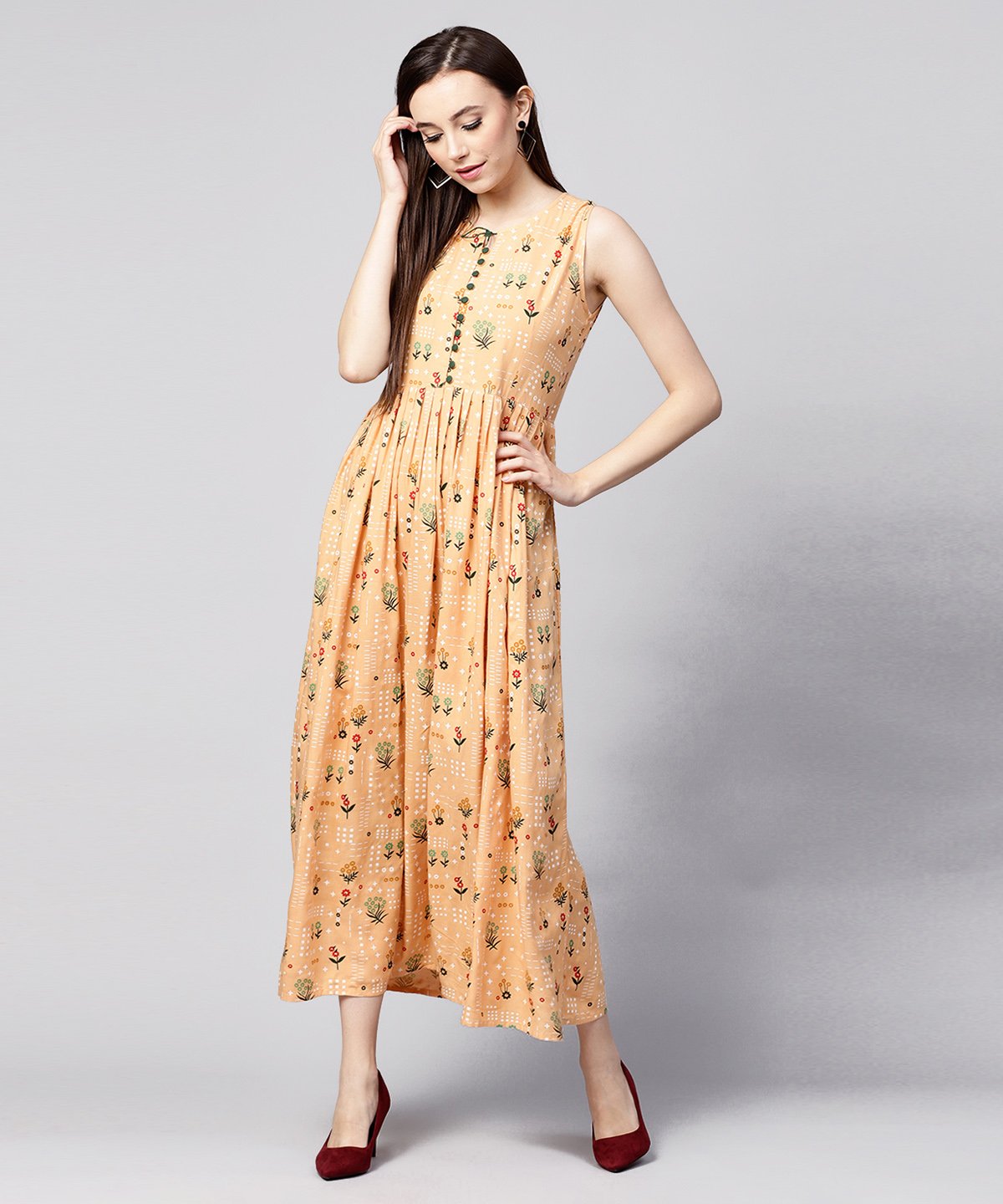 Women's Yellow Printed Sleeveless Rayon A-Line Maxi Dress With Button  In Yokr