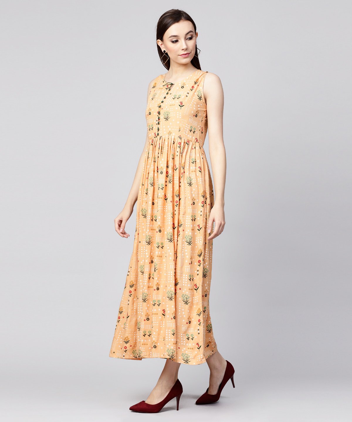 Women's Yellow Printed Sleeveless Rayon A-Line Maxi Dress With Button  In Yokr