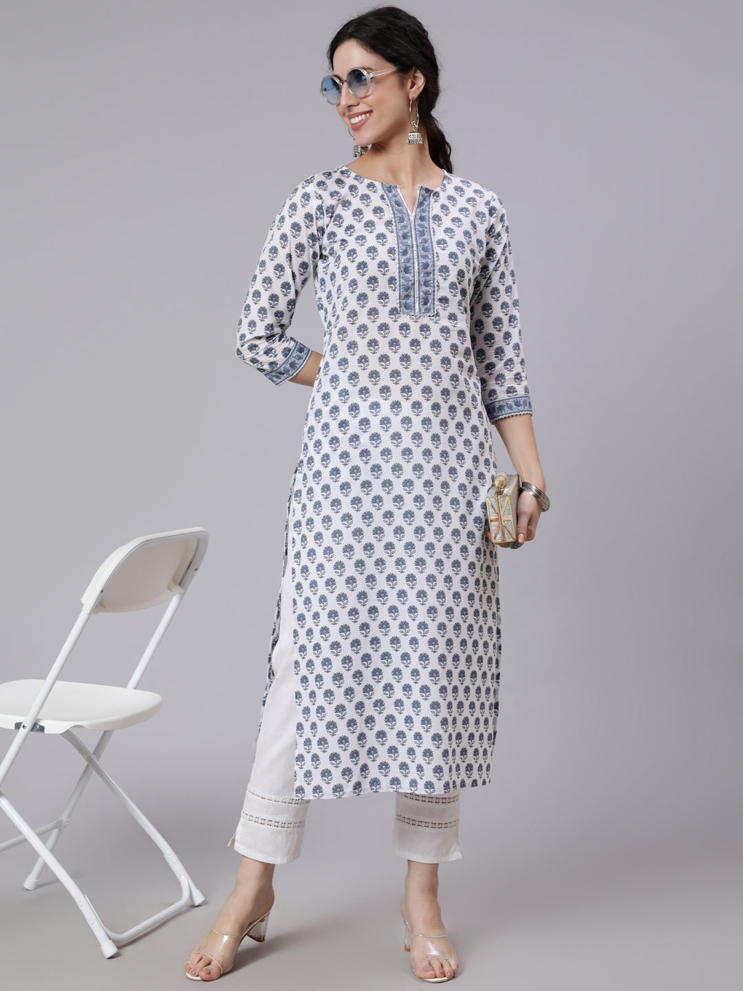 Women's Off-White Printed Straight Kurta With Three Quarter Sleeves