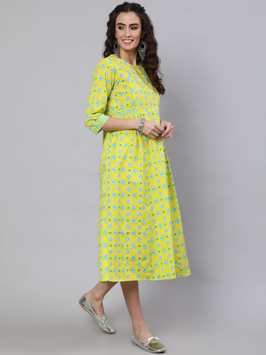 Women's Wome Yellow Ethnic Printed Flared Dress With Three Quarter sleeves