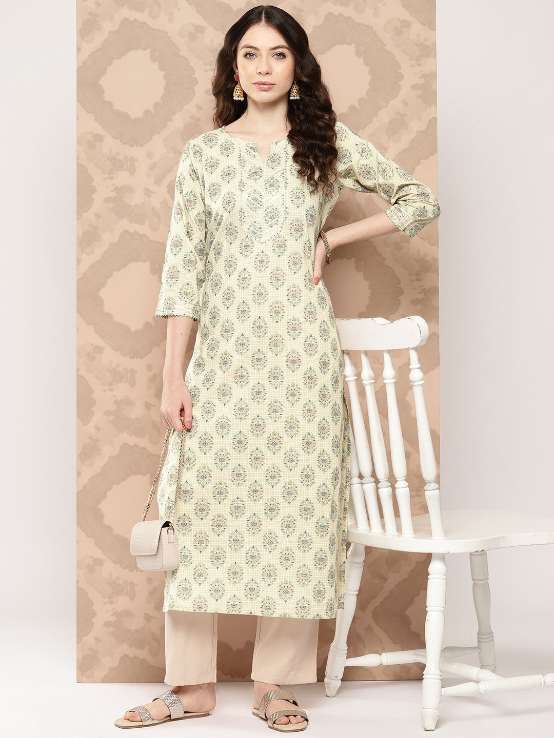 Women's Cream Printed Straight Kurta With Three Quarter Sleeves