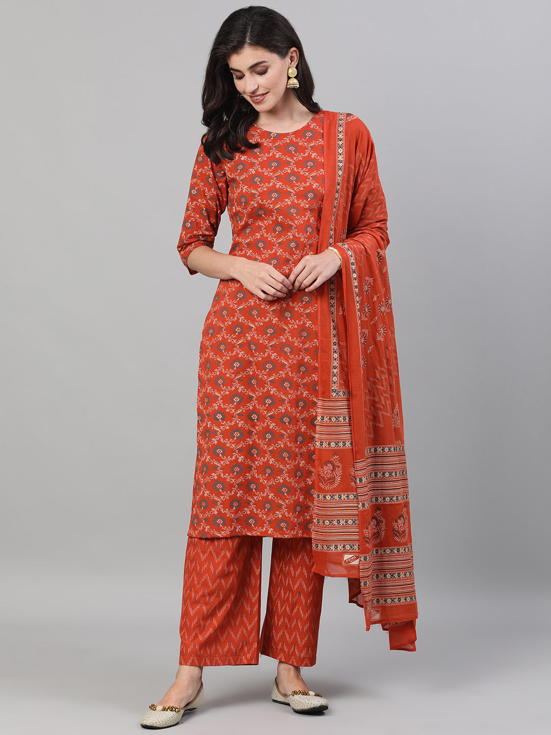 Women's Rust Gold Printed Three-Quarter Sleeves Straight Kurta With Palazzo And Dupatta With Pockets And Face Mask