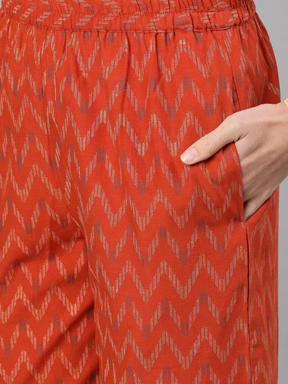 Women's Rust Gold Printed Three-Quarter Sleeves Straight Kurta With Palazzo And Dupatta With Pockets And Face Mask