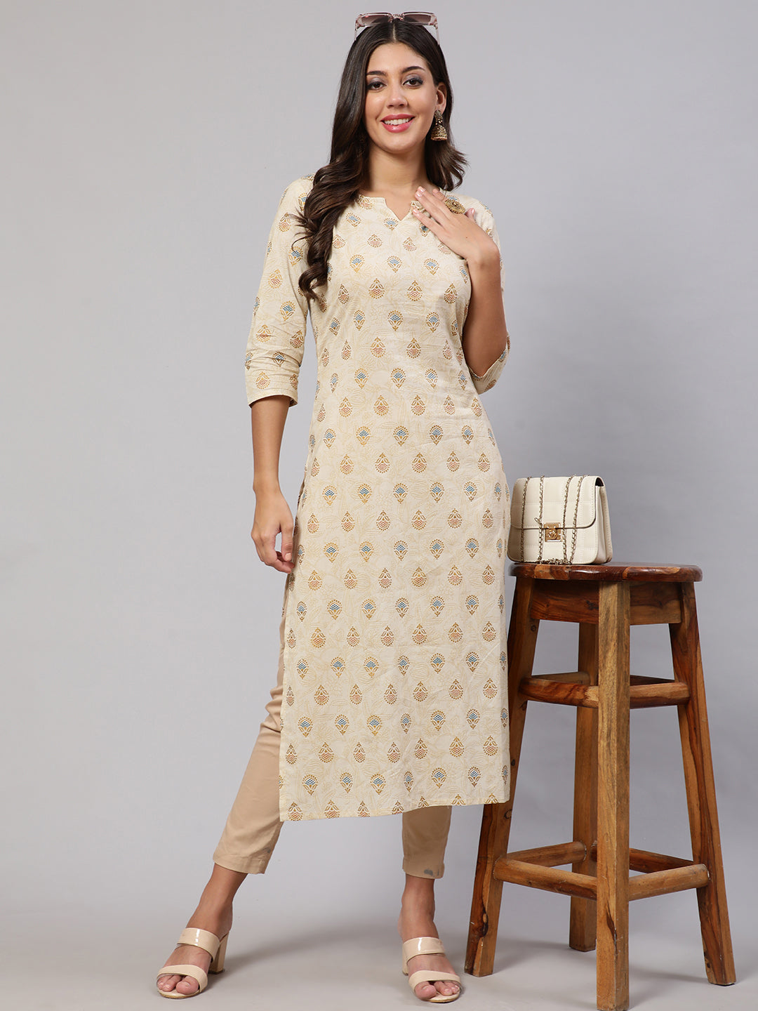 Women's Cream Ethnic Printed Straight Kurta with Three Quarter Sleeves
