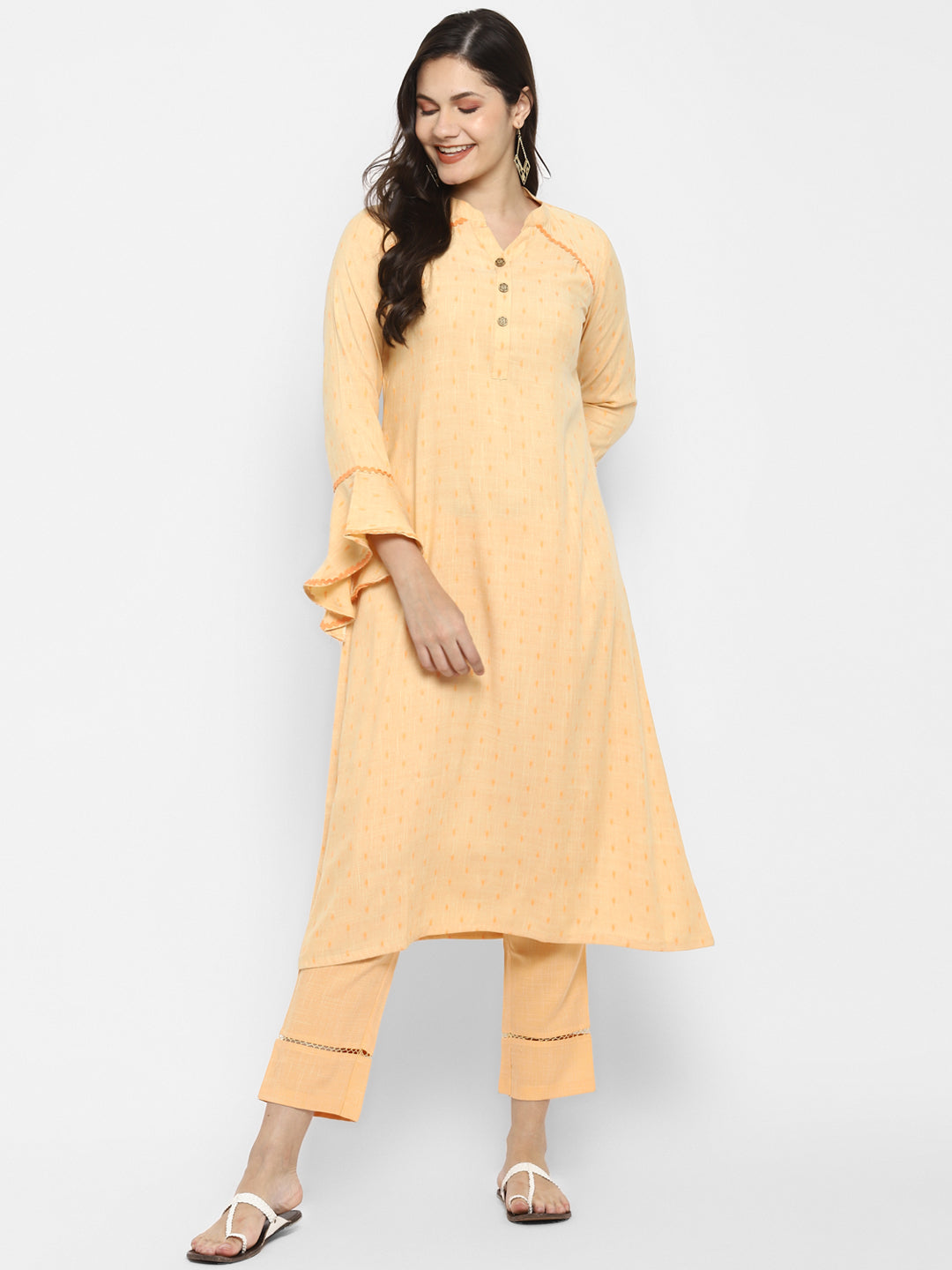 Women's Peach Color Viscose Blend Floral A-Line Self Design Kurta Pant Set