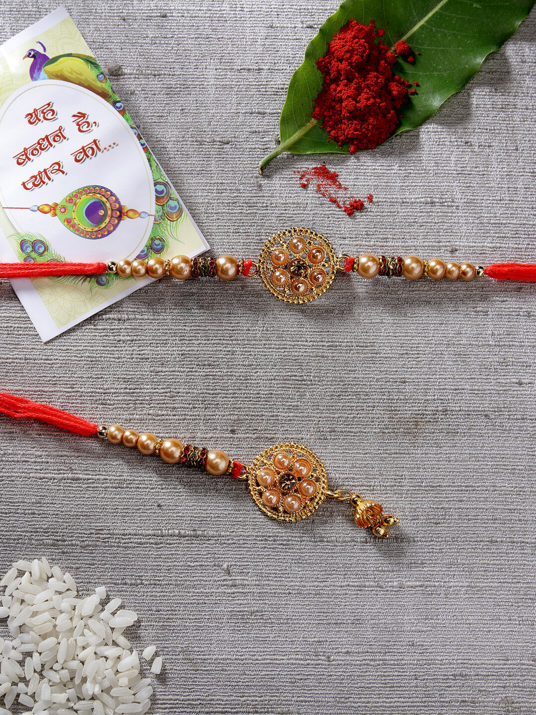 Set Of 2 Gold-Toned Stone-Studded & Beaded Bhaiya Bhabi Rakhi With Roli Chawal