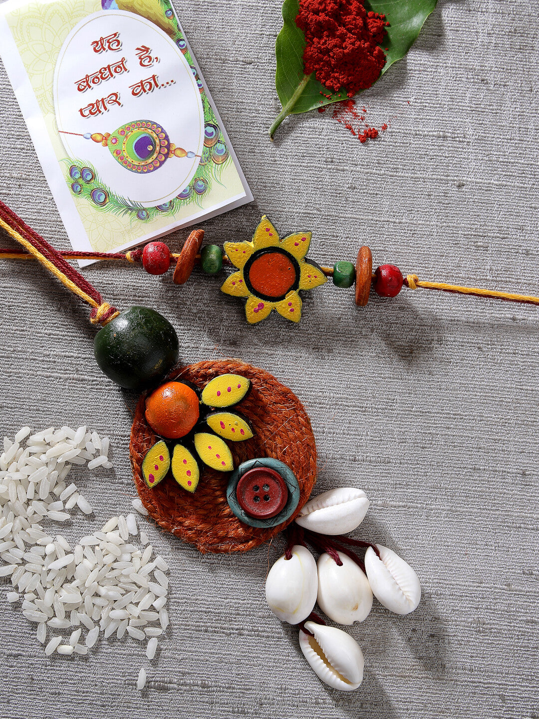 Set Of 2 Multicolor Sea Shell Handcrafted Bhaiya Bhabhi Rakhi With Roli Chawal & Chocolate
