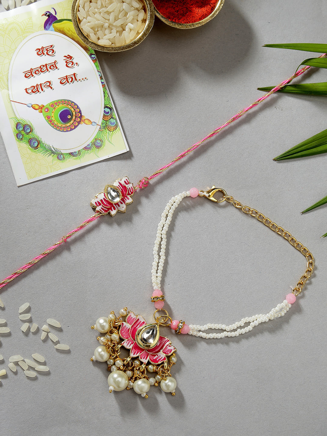 Set Of 2 Pink Lotus Shape Kundan-Studded & Beaded Wraparound Rakhi Set With Roli Chawal & Chocolate