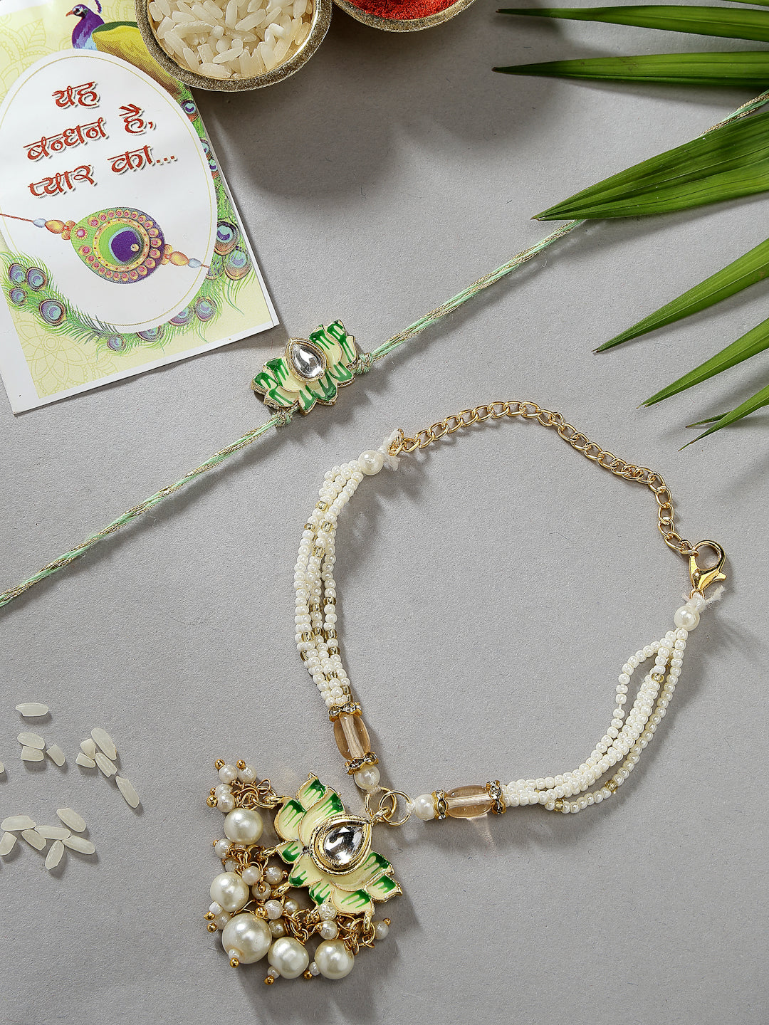 Set Of 2 Green Lotus Shape Kundan-Studded & Beaded Wraparound Rakhi Set With Roli Chawal & Chocolate