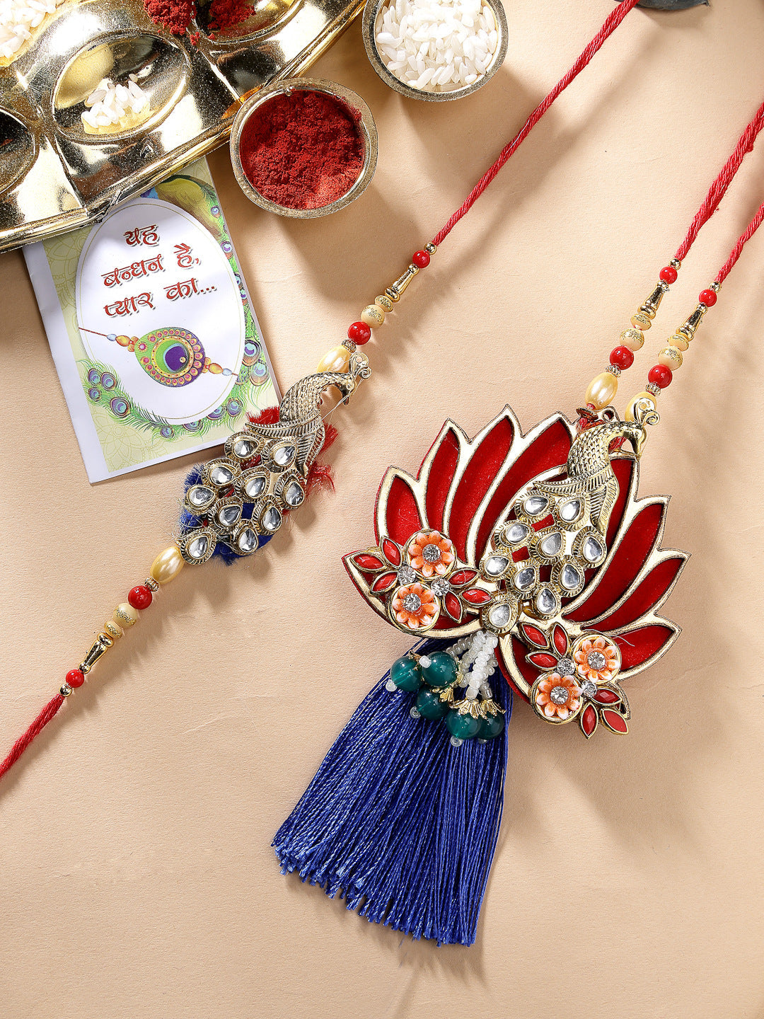 Set Of 2 Gold-Toned Peacock Design Stone-Studded Bhaiya Bhabhi Rakhi With Roli Chawal