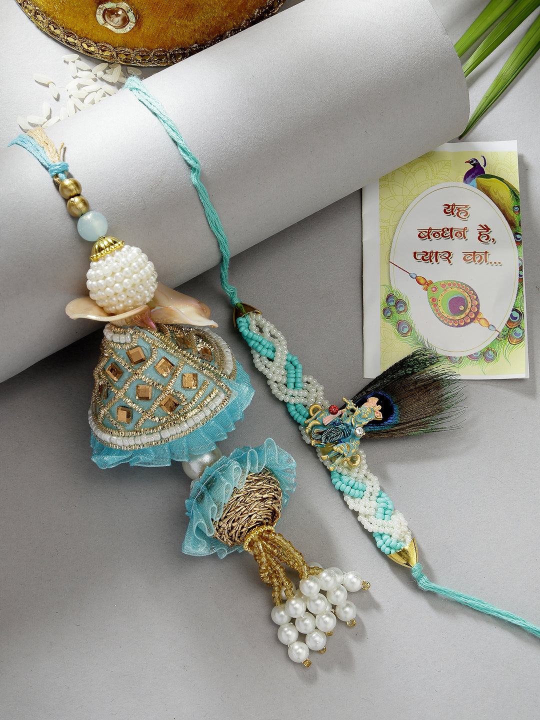 Set Of 2 Blue Krishna Pearl Bhaiya Bhabhi Rakhi With Roli Chawal